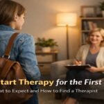 Person starting therapy session for the first time with a professional therapist in a comfortable office